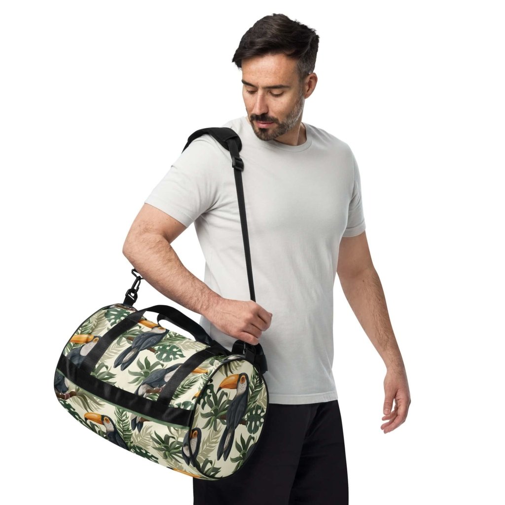 Toucan and Leaves Print Gym Bag - 100% Polyester, Dual Padded Handles, Inside Pocket, T-piping for Stability, Water-Resistant and Durable - Lorri Melas