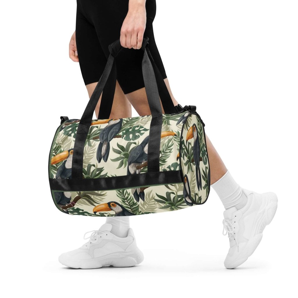 Toucan and Leaves Print Gym Bag - 100% Polyester, Dual Padded Handles, Inside Pocket, T-piping for Stability, Water-Resistant and Durable - Lorri Melas